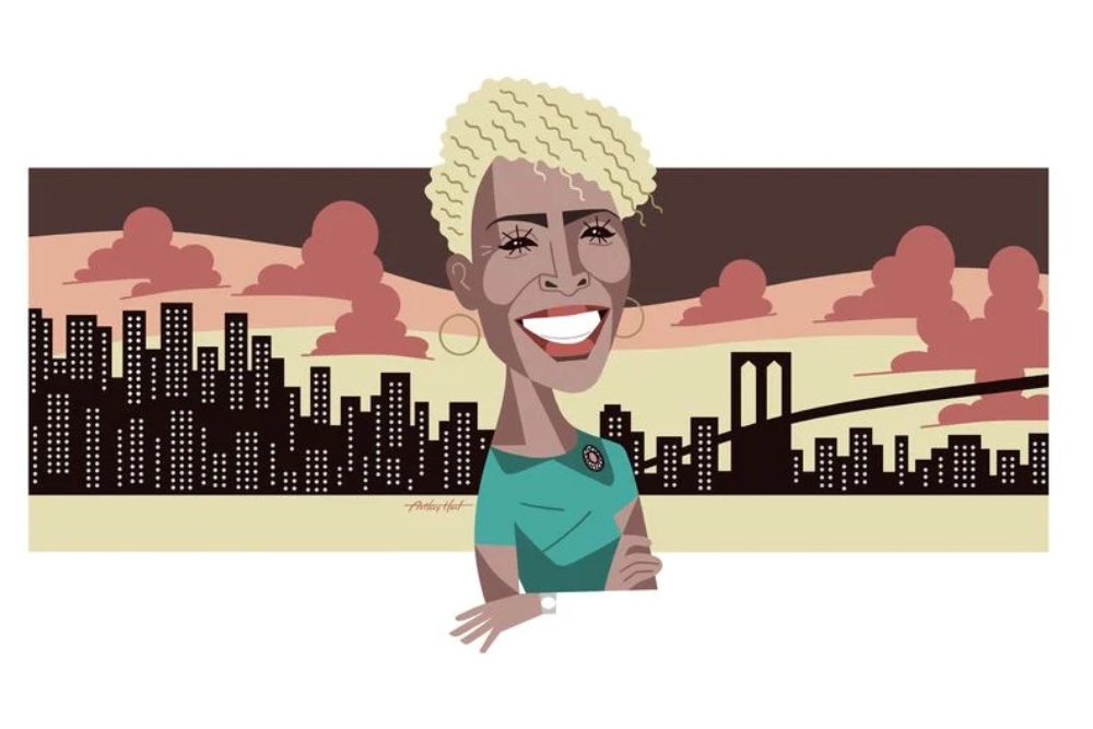 Caricature of a smiling person with short curly hair in a green top, standing in front of a city skyline with a bridge and sunset background.