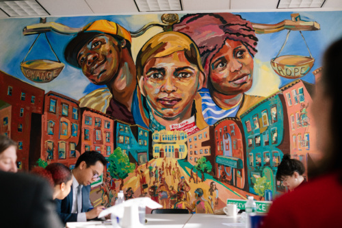 A group of people sitting at a table.
