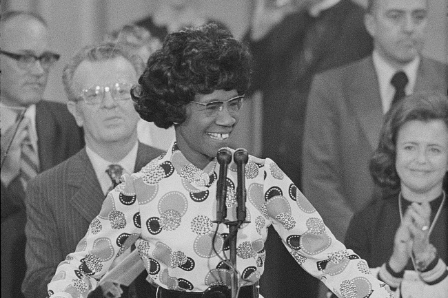 A woman speaking at the podium during the 1972 democratic national convention.