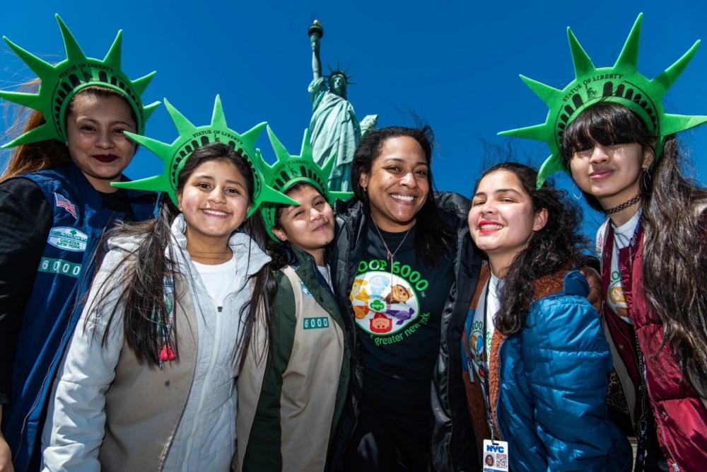 This photo provided by Girl Scouts of Greater New York shows Girl Scouts Troop 6000 paying a visit to the Statue of Liberty in New York in 2023.