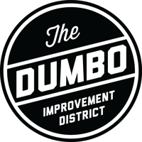 Logo of the DUMBO Improvement District, featuring bold text inside a circular frame on a dark background.