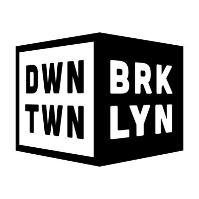 Black and white logo featuring a cube with the words "DWN BRK LYN" representing "Downtown Brooklyn.