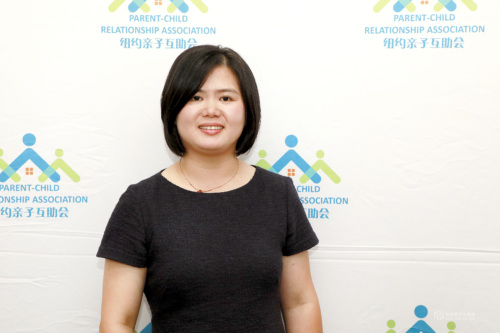 A woman in a black dress stands in front of a backdrop with the logo and text "Parent-Child Relationship Association.