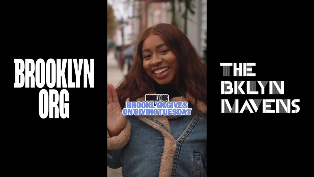 A person smiling and waving, wearing a denim jacket. The text reads "Brooklyn Gives on Giving Tuesday" and "The Bklyn Mavens.