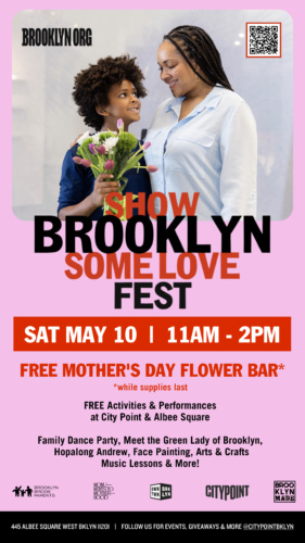 A woman and child embrace and smile in front of a colorful event poster for the "Show Brooklyn Some Love Fest," promoting activities for families on May 10.